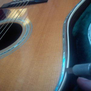 image loose waist binding on a Martin guitar is prevalent in their instruments