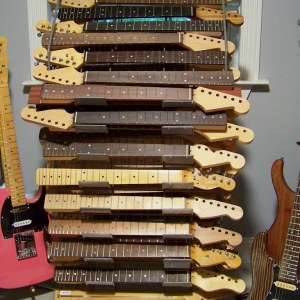 image guitar neck rack in the Haywire Custom Guitars shop.